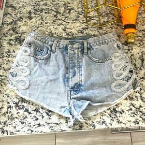 Jean shorts with silver appliqué